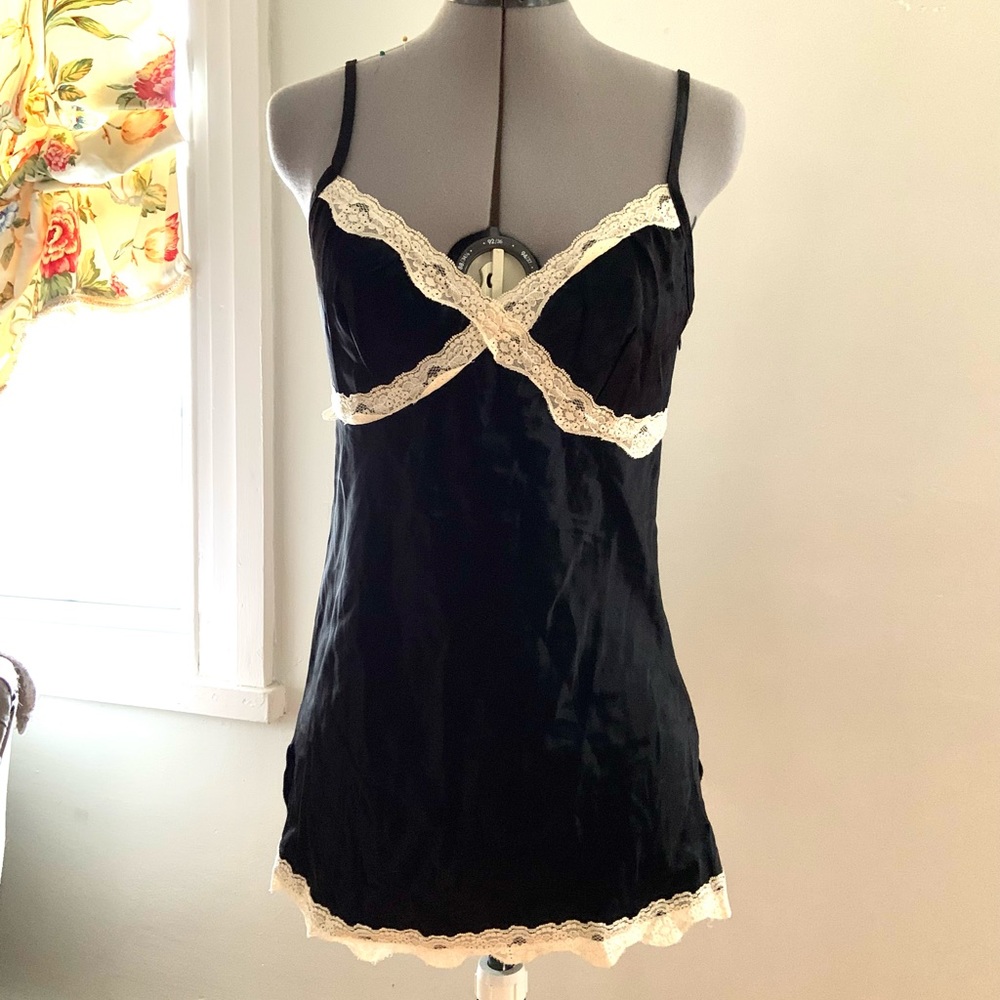 Styles black camisole with white lace trim and side zipper